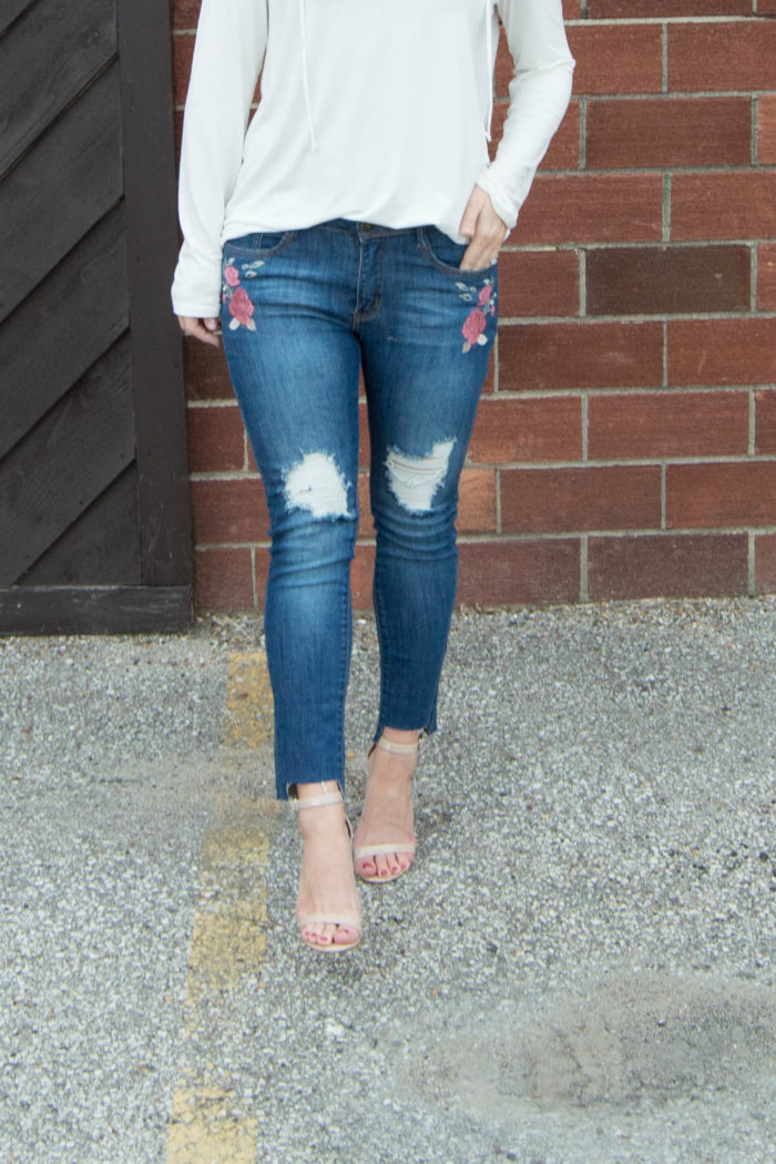 embroidered jeans + lace up top.